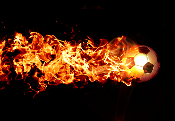 Fiery football on a black background